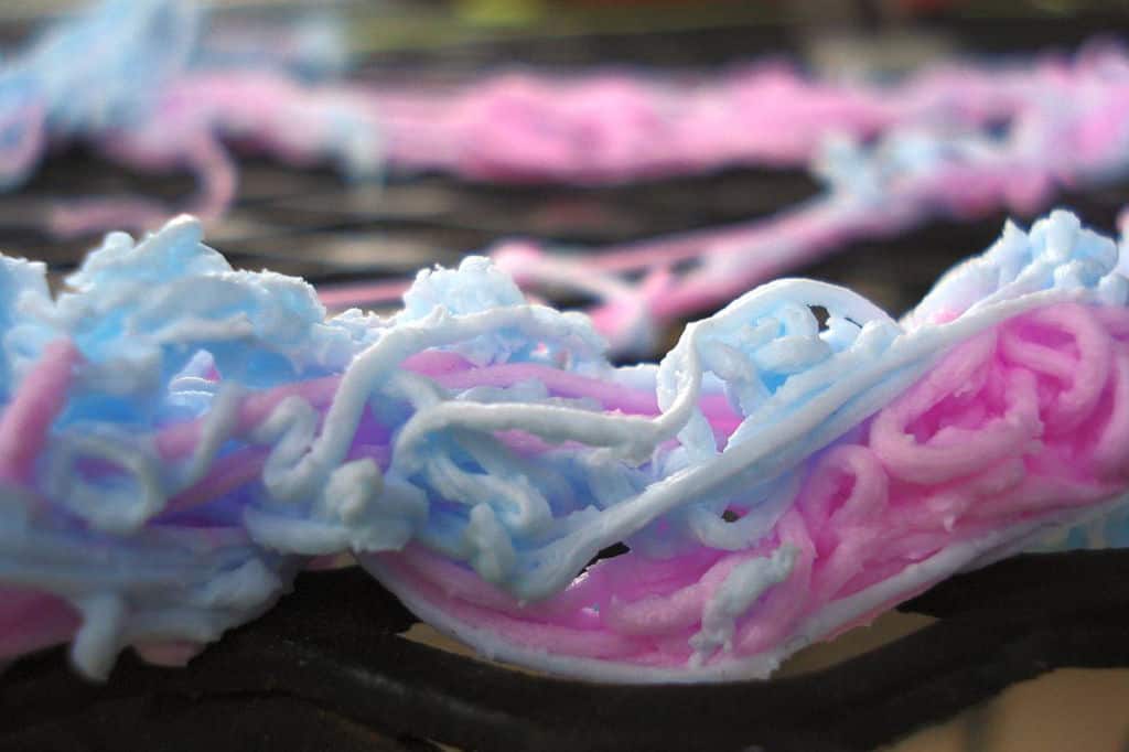 blue and pink silly string up close